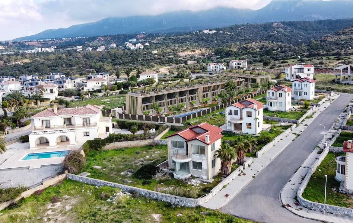 Купить недвижимость на Северном Кипре. ST-103 Таунхаус с видом на море в Эсентепе, Veles