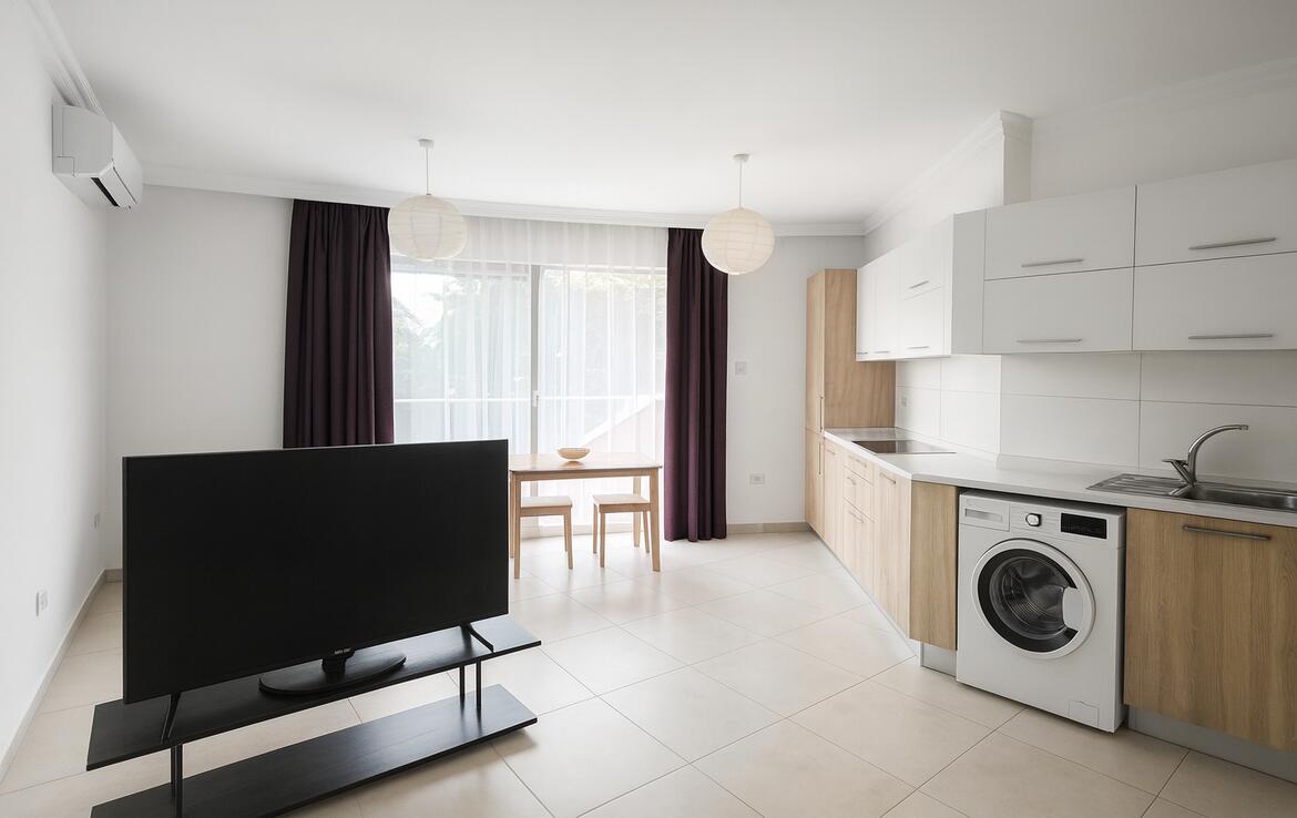 Апартаменты 1+1 с террасой на крыше в комплексе Fuat & Gulfere