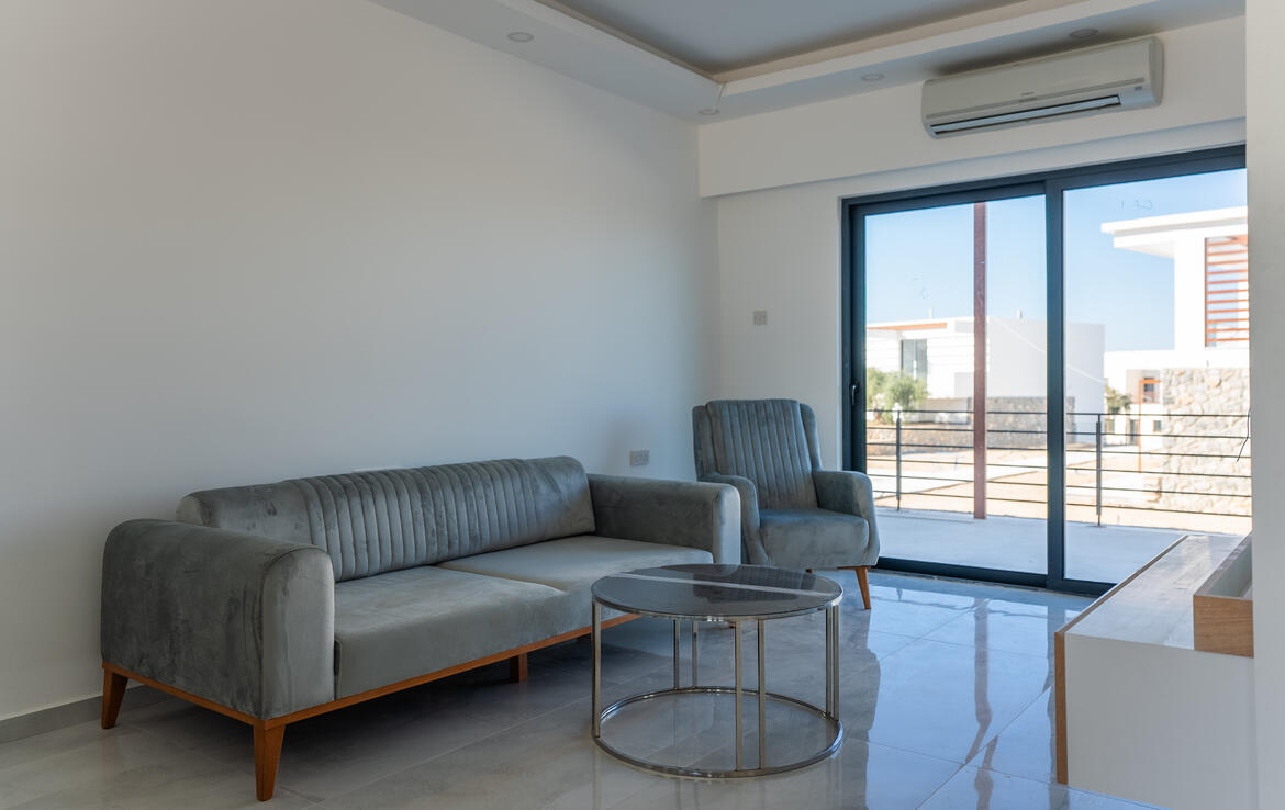 Апартаменты 1+1 с садом в Эсентепе 